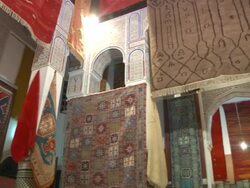 MS PAN Shot of hand made rugs inside of building in city / Fes, Centro-North, Morocco Stock Footage