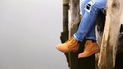 Young woman relaxes on lake Stock Footage