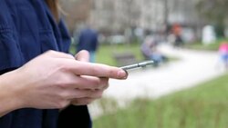 Young girl texting on smart phone Stock Footage