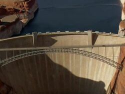 WS AERIAL View of Car, van moving on Hoover Dam bypass bridge / Arizona, United States Stock Footage