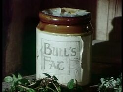 Old flea remedies in bottles and jars on wooden dresser, sequence, archive; SEQUENCE OF CLIPS, SPECIAL TERMS APPLY Stock Footage
