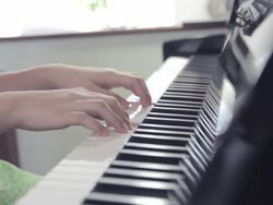 Close-up of girl playing the piano,Dolly shot Stock Footage
