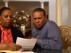 Husband Explains Documents to Wife - WS Stock Footage