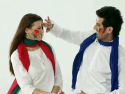 Couple playing holi with colors   Stock Footage