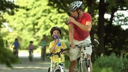 HD: Father And Son Drinking Water Stock Footage