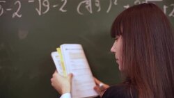 spokesperson pointing at blank drawing board. Stock Footage