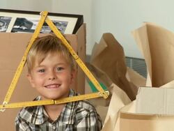 Boy Playing With Folding Ruler Stock Footage
