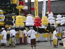 MS Balinese people visiting colorful decorated  Mother temple of Besakih for ceremony / Besakih, Bali, Indonesia Stock Footage
