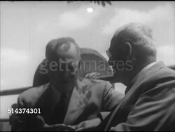 1952: SECRETARY OF STATE: WS (POV Center median looking north) Park Avenue, New York City. VS President-Elect Dwight D. Eisenhower sitting outside talking w/ John Foster Dulles (1888-1959), No SOT. Instructional Video