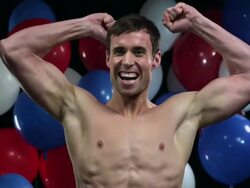 Man cheering with balloons in background Stock Footage