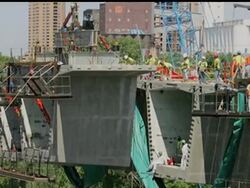 Officials have set the date and the scene for the opening of the new Interstate 35W bridge: Thursday morning when a slow procession of state troopers leads commuters across the Mississippi River where 13 people died in the collapse 13 months ago. News Clip