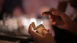 Lighting a cigar Stock Footage