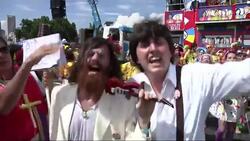 Fifty thousand Beatles fans take to the streets dressed as the Fab Four News Clip