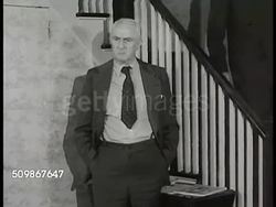 1948: DRAMATIZATION OF HOUSE CALL: Grandfather in living room talking to children, neighbor, saying he's against operations, relating story about having appendix out, doctor interrupting him, saying things have changed. Children looking happy. Instructional Video