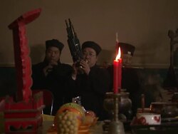 Priests play instruments as incense burns in the Bai Yun Guan Temple in Beijing. Stock Footage