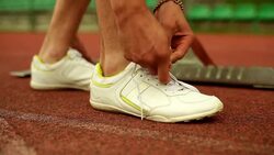 Tying a shoe before running Stock Footage