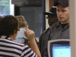 MS Two job seekers are assisting by clerk standing at counter of state run job center / Jackson, Michigan, United States  Stock Footage