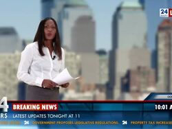 HD: Newscaster Reading Breaking Business News Stock Footage