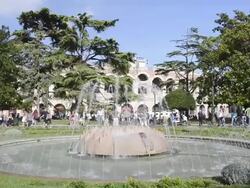 MS Tourist roaming at fountain in front of Arena di Verona at Piazza Bra / Verona, Veneto, Italy Stock Footage