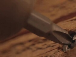 CU of Screw being unscrewed / Los Angeles, California, United States Stock Footage