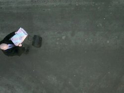 HD CRANE: Businessman Got Lost In The City Stock Footage