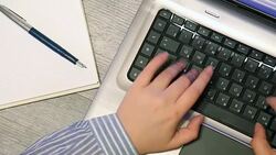 Businesswoman using laptop Stock Footage