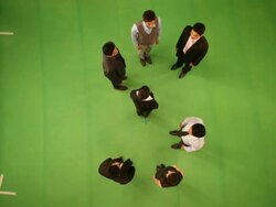 Business people forming alphabet S Stock Footage