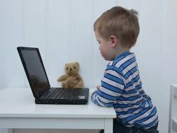 Young boy with laptop Stock Footage