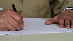 Humble student writing Stock Footage