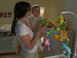 HD DOLLY: Mother Playing With Sleepless Baby Stock Footage