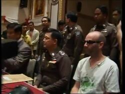 WRAP Suspected paedophile arrested, arrival at stn, ADDS police and Interpol presser Instructional Video