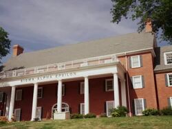 Drive by brick college fraternity house, Sigma Alpha Epsilon Stock Footage