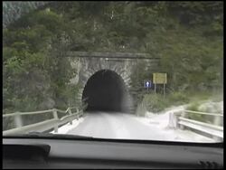 Driving into Raw Mountain Rock tunnel (Carrara, Italy) Stock Footage