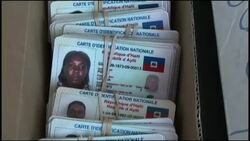 Queues outside offices to collect election voting ID cards Instructional Video