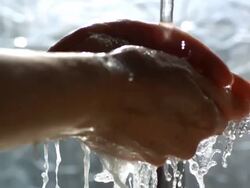 CU hands washing under tap, UK Stock Footage