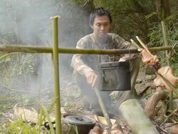 Forester preparing food. Stock Footage