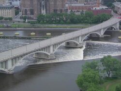 WS View of bridge on mississippi river / Minneapolis, Minnesota, United States  Stock Footage
