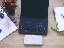 Office supplies and gadgets on wooden table Stock Footage