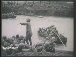 1937: CHINA: SECOND SINO-JAPANESE WAR: WS Japanese soldiers carrying assault boats on land. VS Soldiers on shore FG, assault boats moving across Yangtze River BG. VS Boats launching from riverside, boats crossing through fog, landing. Instructional Video