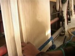 Tireless working hands of a Tibetan carpet weaver. Stock Footage