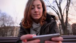 Woman using smartphone Stock Footage