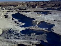 AERIAL TS WS view of downwards of dead sea salt on formations and Cliff / Sourn Judea Desert, Israel  Stock Footage