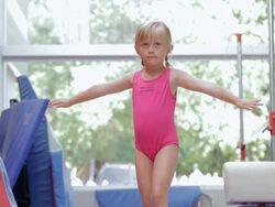  Child carefully walking on balance beam / Vancouver, British Columbia, Canada Stock Footage