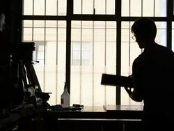 Craftsman 'Luthier' Nigel Forster making hand made Guitars Stock Footage