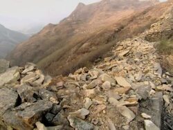 A pile of rocks that was a hideout for the men that guarded the Great Wall of China.  Stock Footage