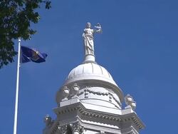 Sculpture of Justice on Top of Cupola of City Hall Stock Footage