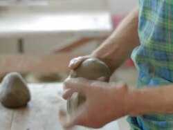 potter preparing clay in workroom Stock Footage