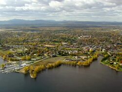 WS AERIAL ZI View of Plattsburgh city at near bay / New York, United States Stock Footage