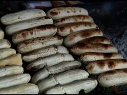 Food Preparation: Banana /  Skewers on Charcoal Grill Stock Footage