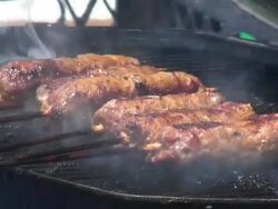 HD: Turning Lamb Kebabs, Kebobs, Kebaps, Kibobs Stock Footage